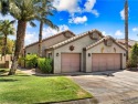 Nestled between the majestic backdrop of golf course greens and for sale in Laughlin Nevada Clark County County on GolfHomes.com