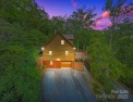 Nestled on a peaceful hilltop, this spacious 3-bedroom for sale in Black Mountain North Carolina Buncombe County County on GolfHomes.com