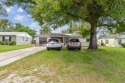 4 bedrooms + den and 2 bathroom POOL home, centrally located in for sale in Tampa Florida Hillsborough County County on GolfHomes.com