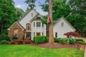 Welcome to this elegant hard-coat stucco Estate home, ideally for sale in Johns Creek Georgia Fulton County County on GolfHomes.com