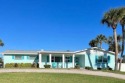 Located just 11 houses from the beach, this 1,634 square foot for sale in Ormond Beach Florida Volusia County County on GolfHomes.com