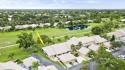 Lovely light and bright 2 bedroom, 2 bath villa with an for sale in Hobe Sound Florida Martin County County on GolfHomes.com
