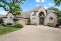 Love Golf?  This custom home with a beautiful pool is situated for sale in Mansfield Texas Tarrant County County on GolfHomes.com