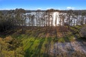 Located along the shores of Buck Lake, this expansive 2.15-acre for sale in Orlando Florida Orange County County on GolfHomes.com