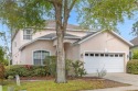This beautiful 2-story home is located in a quiet cul-de-sac for sale in Davenport Florida Polk County County on GolfHomes.com