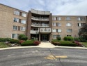 Top-Floor Beauty in Willow Creek!  Welcome to 900 E Wilmette Rd for sale in Palatine Illinois Cook County County on GolfHomes.com