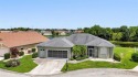 SENSATIONAL WATER VIEW from a MASSIVE enclosed and tiled lanai for sale in Punta Gorda Florida Charlotte County County on GolfHomes.com