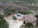 RIVERFRONT With Pool! Mediterranean estate sprawls across 2.01 for sale in Concan Texas Uvalde County County on GolfHomes.com