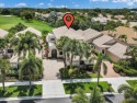 Opportunity awaits with this sunfilled voluminous two-story home for sale in Boca Raton Florida Palm Beach County County on GolfHomes.com