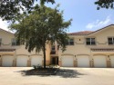 NEW PRICE! Indulge in the comfort of this 3/2.5 two-level condo for sale in Palm Coast Florida Flagler County County on GolfHomes.com
