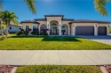 Stunning luxury executive home located in the intimate gated for sale in Cape Coral Florida Lee County County on GolfHomes.com