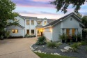 This custom home boasts an elegant and spacious design for sale in The Hills Texas Travis County County on GolfHomes.com