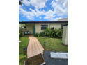 Renovated one story townhouse in GROVE VILLA.  Offers 3 bedrooms for sale in Miami Florida Miami-Dade County County on GolfHomes.com