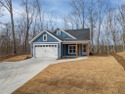 Amazing new build with winter views of Lake Hartwell. Welcoming for sale in Westminster South Carolina Oconee County County on GolfHomes.com