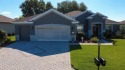 Stunning home loaded with upgrades on a deep semi-private lot for sale in Summerfield Florida Marion County County on GolfHomes.com