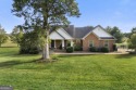 Welcome to this stunning 4-bedroom, 2.5-bath brick home nestled for sale in Cedartown Georgia Polk County County on GolfHomes.com