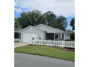 2/2 Colony Patio Villa with front screened Lanai in the sought for sale in Lady Lake Florida Sumter County County on GolfHomes.com