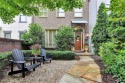 Showcase listing in the gated townhomes in Windermere Golf & for sale in Cumming Georgia Forsyth County County on GolfHomes.com