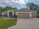 Fabulous Santa Rosa model boasts brick pavers on driveway and for sale in Summerfield Florida Marion County County on GolfHomes.com