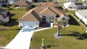 Stunning home, beautiful open floor plan, located in the quiet for sale in Ocala Florida Marion County County on GolfHomes.com