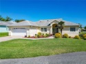 MUST SEE!  This is a Monterey model concrete block and stucco for sale in Summerfield Florida Marion County County on GolfHomes.com