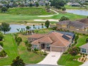 MILLION DOLLAR GOLF COURSE and WATER VIEW with FABULOUS POOL and for sale in The Villages Florida Lake County County on GolfHomes.com