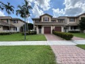 Fabulous, spacious townhome on lake. Tiled 1st floor, granite for sale in Davie Florida Broward County County on GolfHomes.com