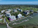 Discretely located behind the guarded gates of the prestigious for sale in Belleair Beach Florida Pinellas County County on GolfHomes.com