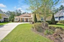 A Coastal home on over a half-acre, built by Fogelman & for sale in Leland North Carolina Brunswick County County on GolfHomes.com
