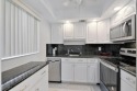 Ground floor 2 bed 2 bath unit, renovated kitchen with stainless for sale in Delray Beach Florida Palm Beach County County on GolfHomes.com