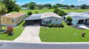 Welcome to this beautifully remodeled 2-bedroom, 2-bathroom home for sale in Lady Lake Florida Sumter County County on GolfHomes.com