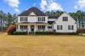 This lovely 2-story home is located within the Timberlake Golf for sale in Clinton North Carolina Sampson County County on GolfHomes.com