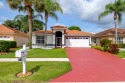 Welcome Home to this beautifully maintained 3/2/2 home in for sale in Lake Worth Florida Palm Beach County County on GolfHomes.com