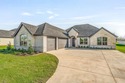 Welcome to this brand-new home by Al Couto Homes, located in the for sale in Granbury Texas Hood County County on GolfHomes.com
