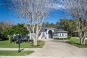 This is a stunningly well maintained 4 bedroom 3 bathroom custom for sale in Lakeland Florida Polk County County on GolfHomes.com