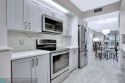 Move right into this tropical paradise of Wynmoor Village! Fully for sale in Coconut Creek Florida Broward County County on GolfHomes.com