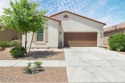 Nestled along a scenic walking trail, this spacious for sale in Casa Grande Arizona Pinal County County on GolfHomes.com