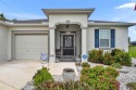 Located in the premier 55+ golf community of Arlington Ridge for sale in Leesburg Florida Lake County County on GolfHomes.com