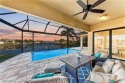 Fall in love with this 2015 built custom waterfront pool home for sale in Punta Gorda Florida Charlotte County County on GolfHomes.com
