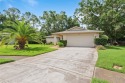 Tucked away at the end of a peaceful cul-de-sac in the highly for sale in Palm Harbor Florida Pinellas County County on GolfHomes.com