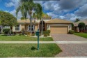 Beautiful updated Maiano model with FANTASTIC lake views!! This for sale in Lake Worth Florida Palm Beach County County on GolfHomes.com