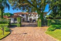 This Mediterranean masterpiece is completely renovated and was for sale in Coral Gables Florida Miami-Dade County County on GolfHomes.com