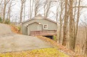 A charming cottage in beautiful Wolf Laurel with privacy and for sale in Mars Hill North Carolina Madison County County on GolfHomes.com