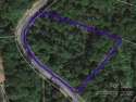 This lot is over two acres, and priced under tax value for sale in Lake Lure North Carolina Rutherford County County on GolfHomes.com