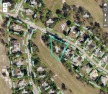 Residential lot backup to Oak Hills Golf Course. Almost  1/2 for sale in Spring Hill Florida Hernando County County on GolfHomes.com