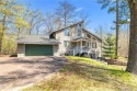 Experience the best of cabin comfort and modern design in this for sale in Danbury Wisconsin Burnett County County on GolfHomes.com