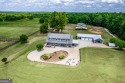 Welcome to a rare & unique Retreat. Surround yourself with for sale in Rutledge Georgia Walton County County on GolfHomes.com