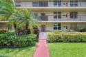 Welcome to your stunning 1st floor lakefront two bedroom condo for sale in Delray Beach Florida Palm Beach County County on GolfHomes.com
