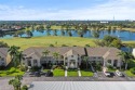 Look no further for the perfect condo with GORGEOUS LONG LAKE for sale in Estero Florida Lee County County on GolfHomes.com