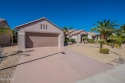 This recently upgraded gem boasts new lustrous vinyl flooring for sale in Surprise Arizona Maricopa County County on GolfHomes.com